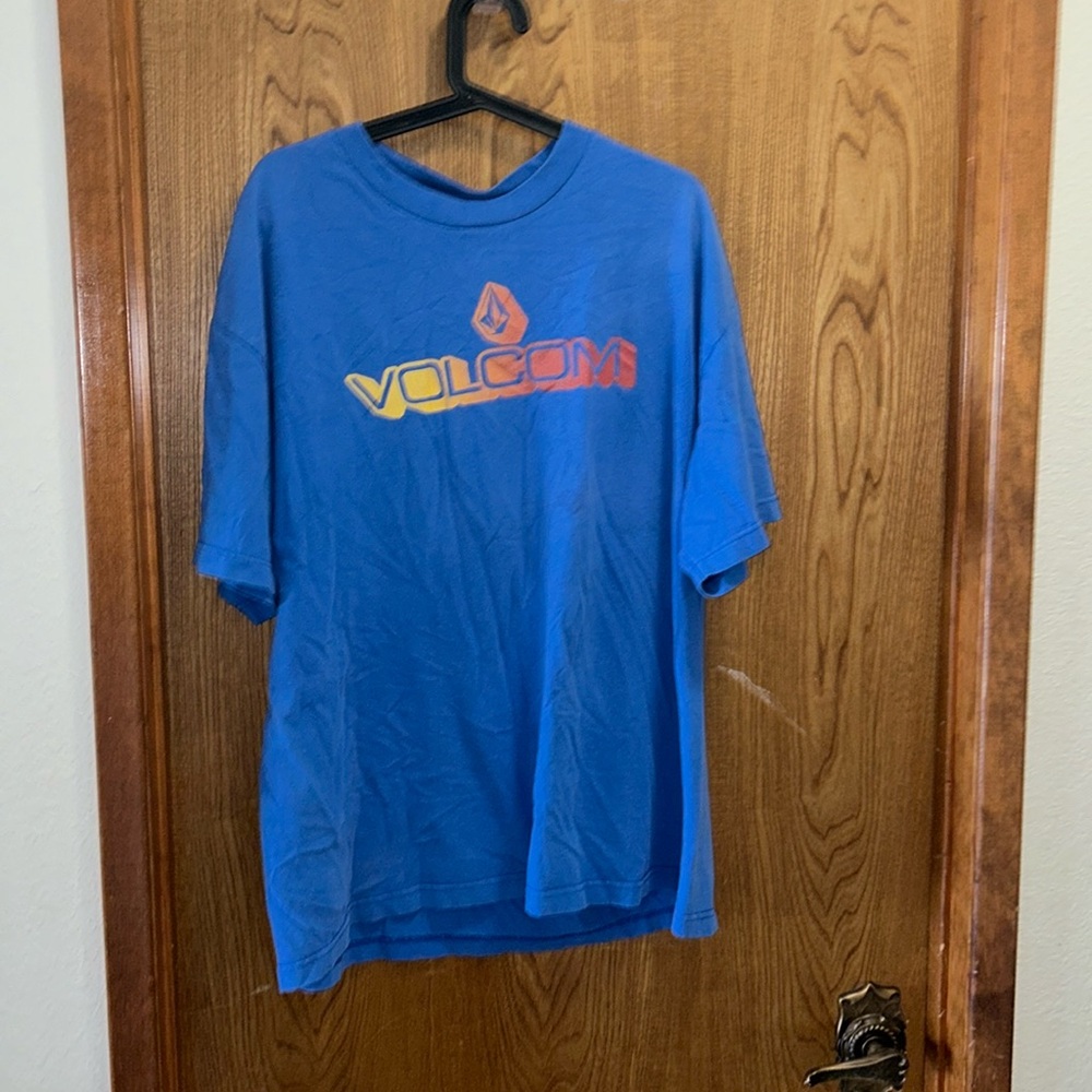 Blue volcom shirt with yellow and orange detail